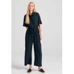 Loose fit ολόσωμη φόρμα με δέσιμο με κόμπο