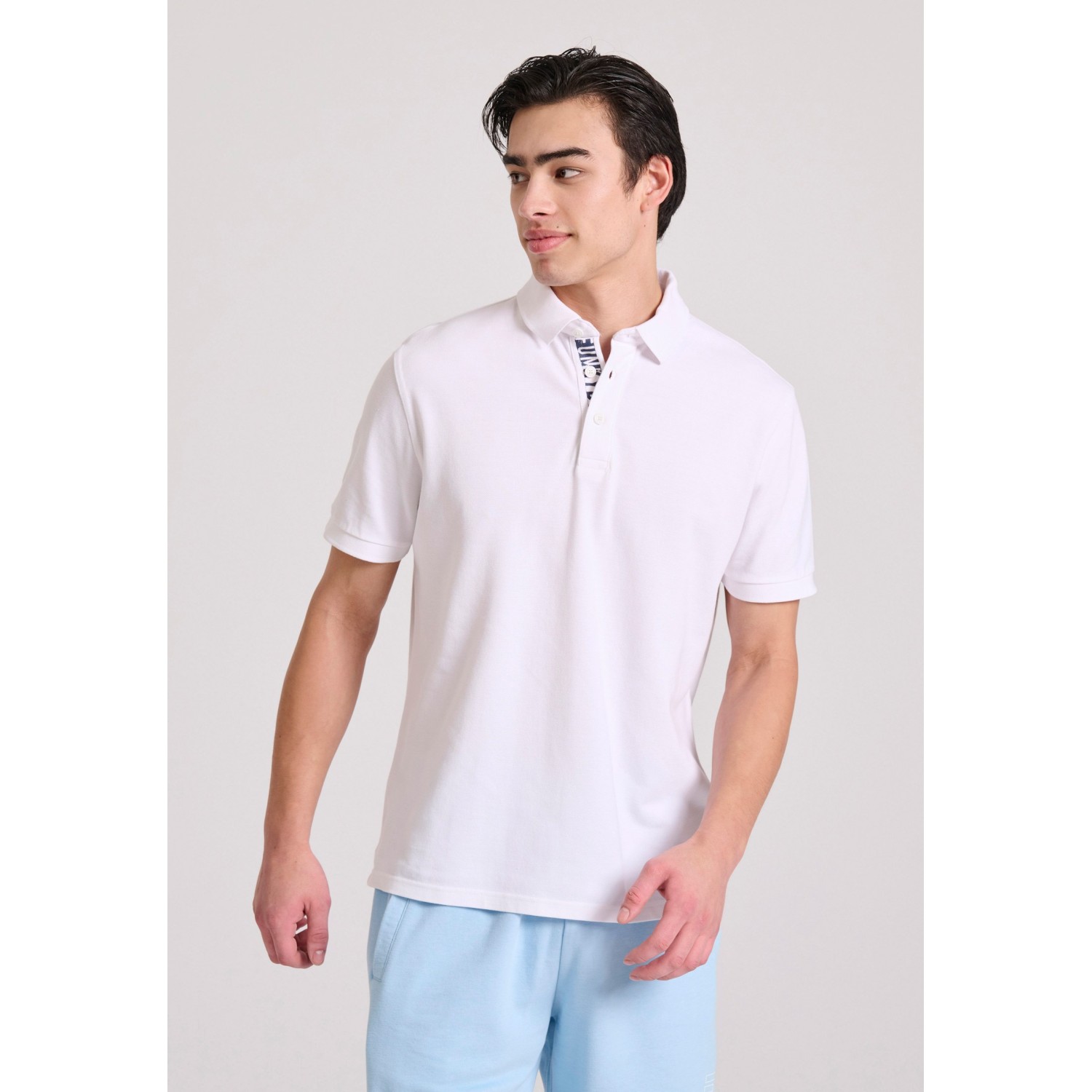 Polo μπλούζα με branded τύπωμα στην εσωτερική πατι