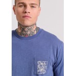 Relaxed fit t-shirt με tropical τύπωμα στην πλάτη
