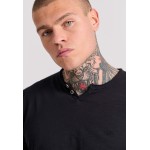 T-shirt με λαιμό henley και raw cuts - The essenti